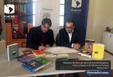 firma convenio.png